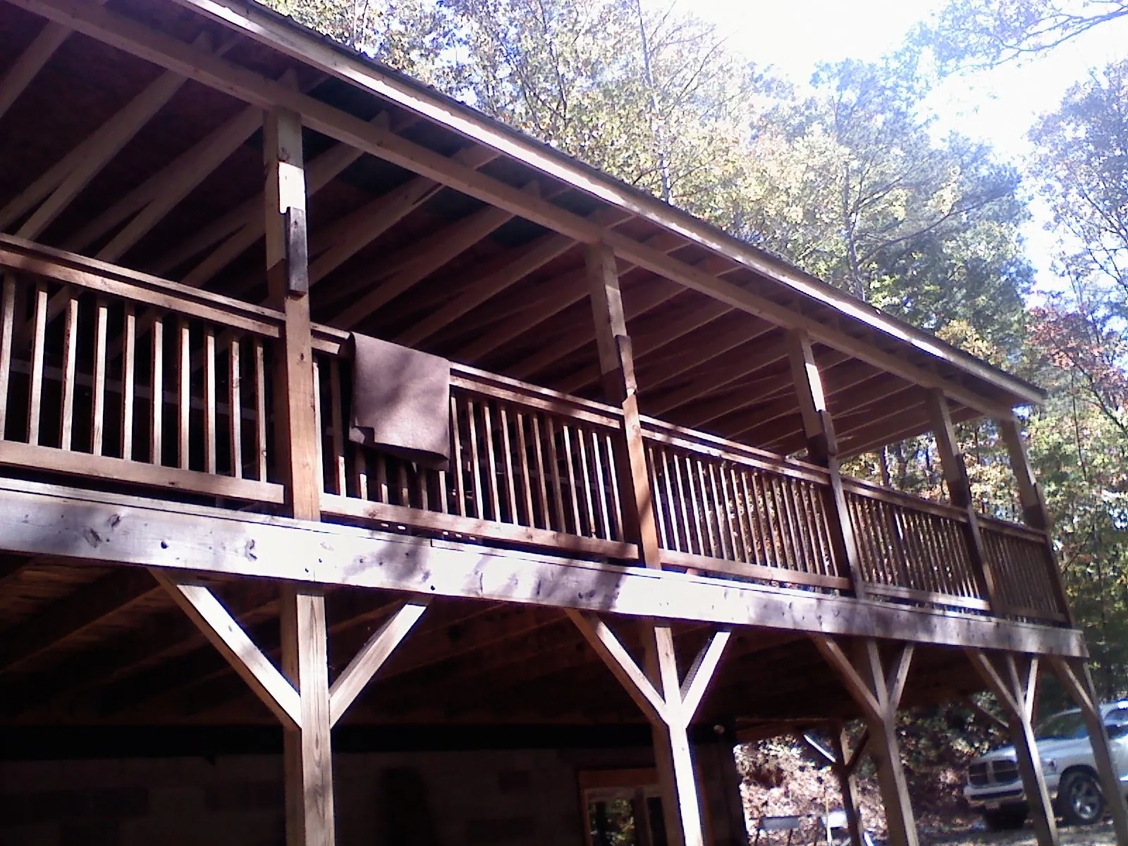 Timber framing under a new elevated porch and deck — Roof Leak Repair in Steamboat Springs by Roofing Brothers